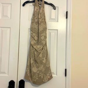 Nicole Miller, size 2 halter style, mid calf dress. Extremely flattering